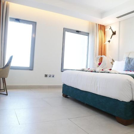 Waterfront Hotel Apartment Lusail Ngoại thất bức ảnh A room at the hotel