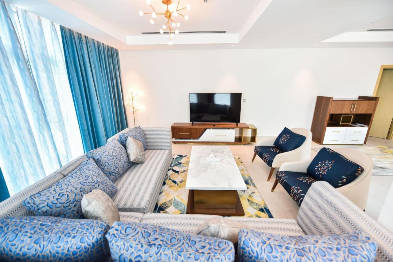 Waterfront Hotel Apartment Lusail Ngoại thất bức ảnh A living room in a luxury apartment