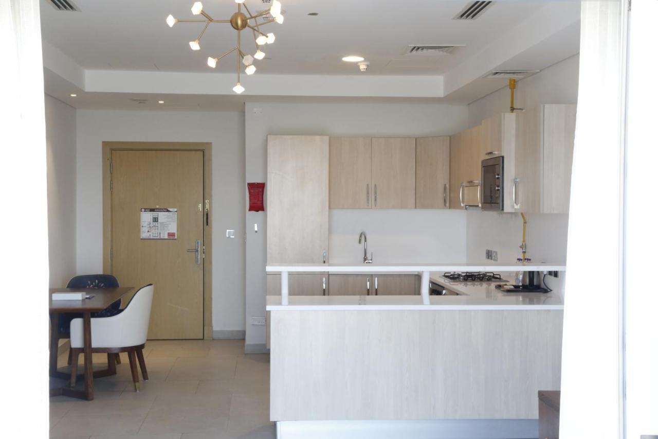Waterfront Hotel Apartment Lusail Ngoại thất bức ảnh A kitchen in a typical apartment